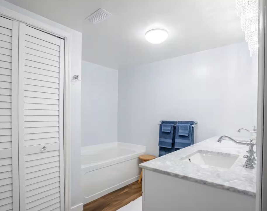 Bathroom with bathtub and separate shower